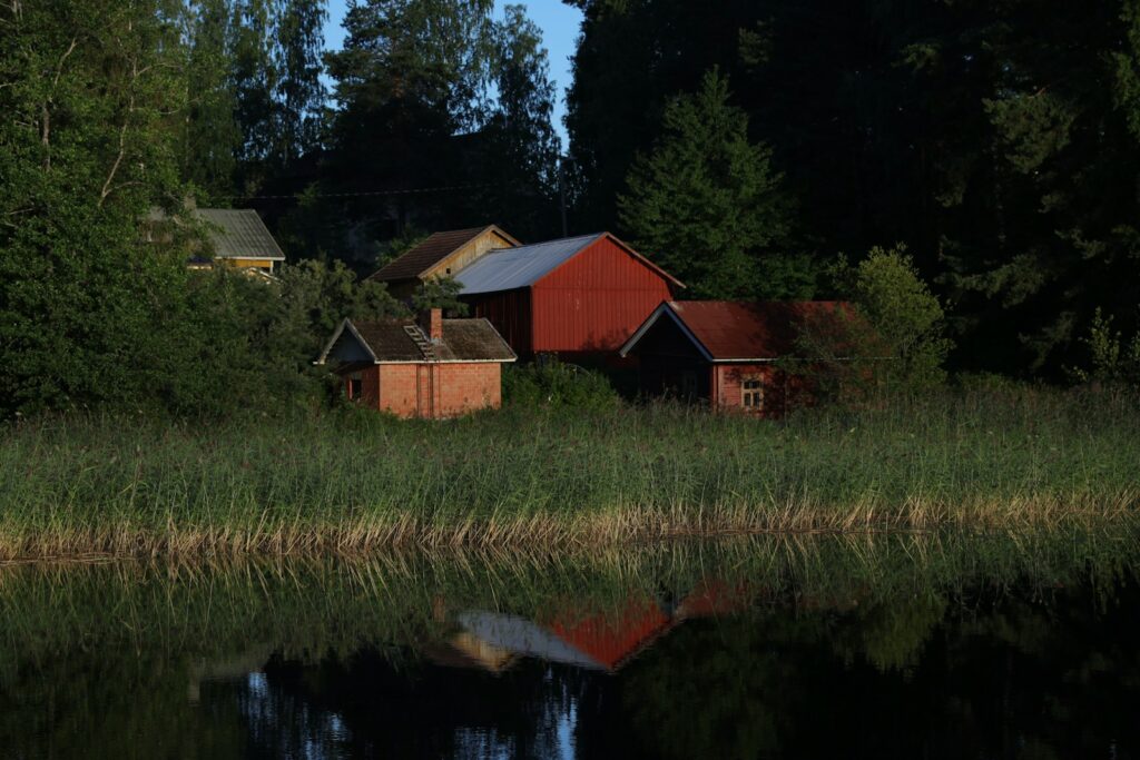 a group of buildings next to a body of water
